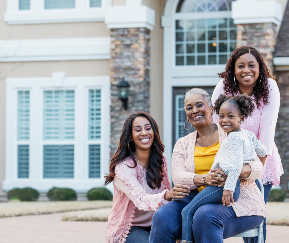 Family in front of house