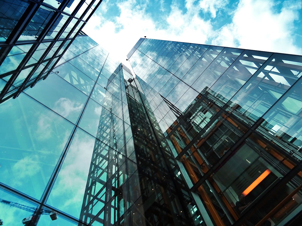Towards sky along glass building